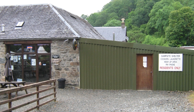  stone built building and metal outbuilding forming the bar and shelter et beinglas campsite